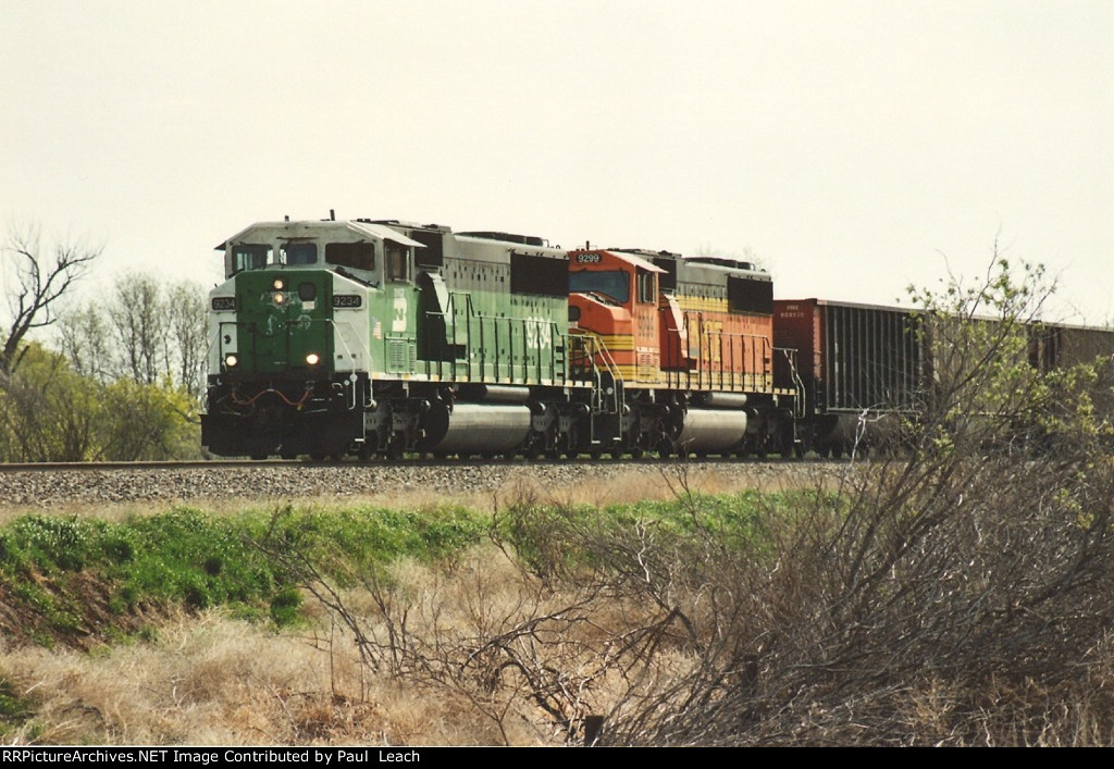 Paused empty coal train waits for a meet